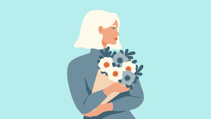 Kvinde-holder-blomster
